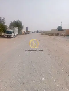 Land for sale in Al Sajaa Industrial Area (Sector S), with an area of 10,250 square feet.