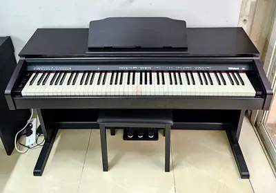 The Roland RP30 is a budget-friendly, 88-key digital upright piano designed for beginners, students,