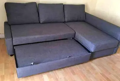 Grey L-shaped Sofa Bed with Pull-out Trundle — Good Condition