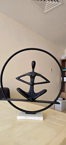 Modern Abstract Metal Sculpture on Circular Base - Decorative Statue