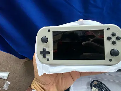 The SJGAM M17 (also sold as the M17 or PSP M17) is an open-source retro handheld game console featur