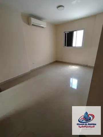 Spacious 1BR in Al Bu Tina, second-occupied building with excellent finishing, split AC and central gas. Family-friendly, commercial use possible, AED