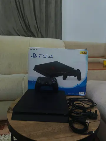 Sony PS4 Slim 1TB with DualShock 4 Controller and Cables - Good Condition