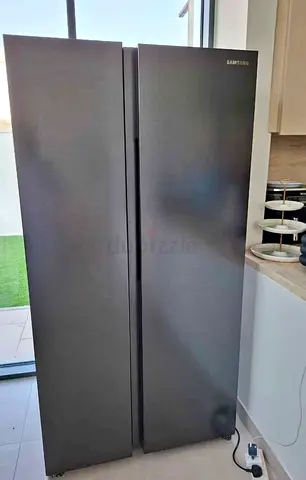 Samsung side by side refrigerator latest model same like new condition