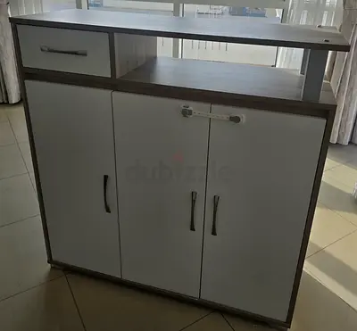 Compact storage cabinet with top shelf and drawer - good condition