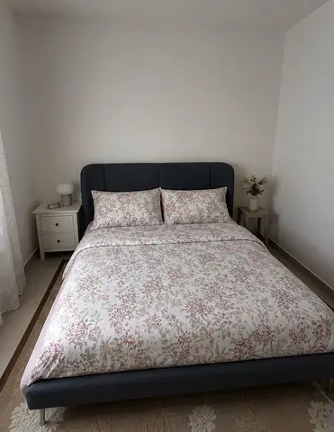 Queen size bed  with a comfortable matress bought from ikea in a very good condition