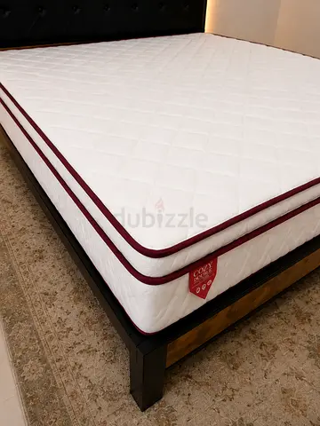 Queen bed frame with mattress — dark wood, slightly negotiable