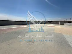 20000 SqFt Interlock Yard on Main Road in Al Sajaa