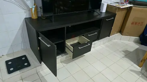 Dark wood TV cabinet with drawers and storage, average condition, have some scratches.