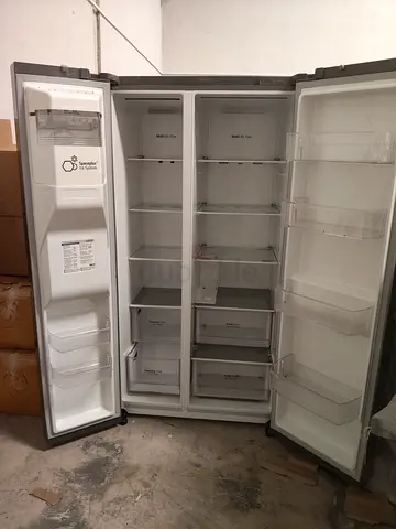 LG Four-Door Refrigerator with Water Dispenser - Stainless Steel
