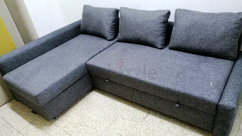Grey L-shaped Fabric Sofa bed with Storage - Good Condition