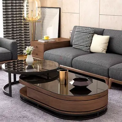 Modern oval wooden coffee table with glossy black top - set of 2
