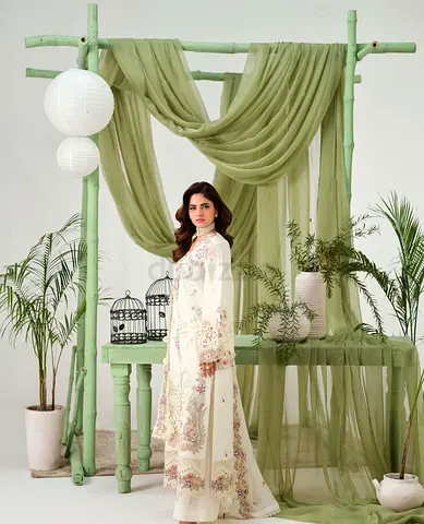 Cream lawn embroidered unstiched 3 piece ramsha brand fully loaded embroidered