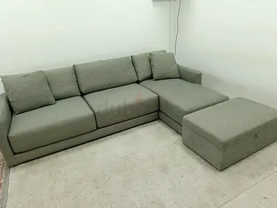 Crate and Barrel gray lshape sofa with ottoman storage