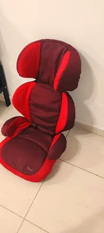 Used red child booster/car seat (high-back) in good condition.