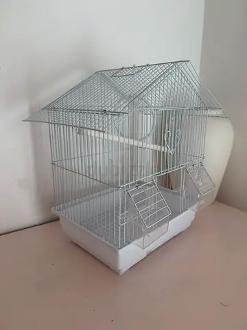 White metal bird cage with removable tray and perches - good condition