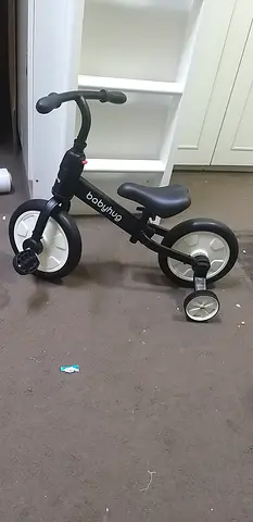 BabyBjorn-style toddler balance bike / ride-on in black — good condition