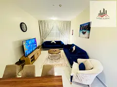 Al Zahia, Sharjah: Apartment with a bedroom, living room, kitchen, and bathroom.