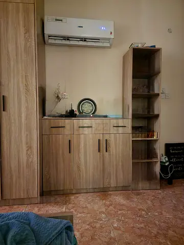 Wooden shoe storage with open shelving