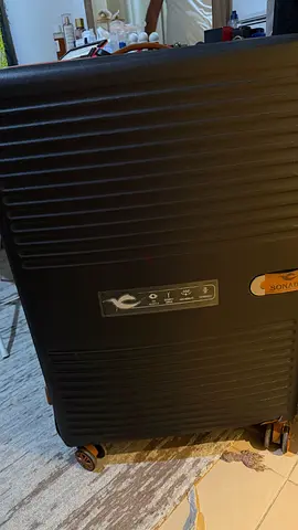 Large black & beige hard-shell spinner suitcase with wheels - good condition