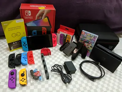 Nintendo Switch Oled extra Joycons,256 gb Sd card, dock, case, original packing & Mario kart game
