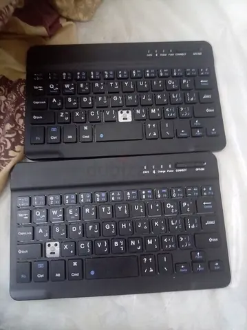Two compact Bluetooth wireless keyboards - black, used