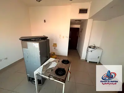 Spacious studio in Al Nabaah near LuLu. Central AC & gas, free parking. 6 payment installments. Prime location with easy access to Dubai.