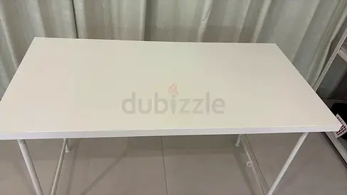 White rectangular dining or study table - simple modern design