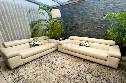 Natuzzi white Leather 4 + 3 Seater Sofas in Excellent Condition