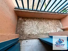 Studio in Al Majarra with separate kitchen and balcony, no AC. AED 14K yearly, 4 payments, with AED 