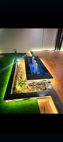 Modern Outdoor Water Feature with Built-in Lighting