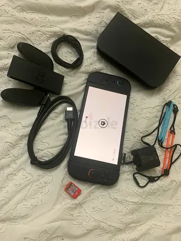 Nintendo Switch 2 (with dock, Joy-Cons, straps and game cartridge) - Good condition