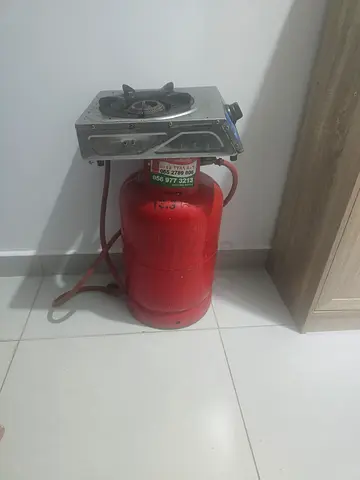 Portable single-burner gas stove with LPG cylinder (used)