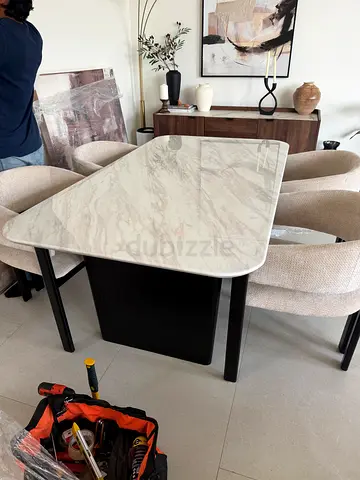 Marble-top dining table with 4 upholstered chairs