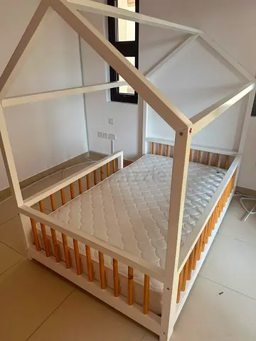 House-frame toddler bed with mattress — white & natural wood, good condition