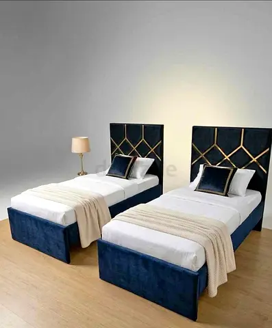 Pair of navy velvet single beds with upholstered headboards - set of 2