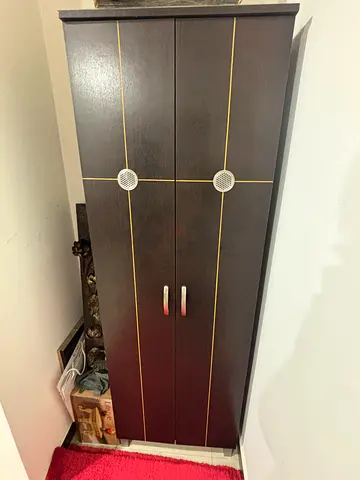 Dark brown 2-door wardrobe,  good condition (price negotiable)