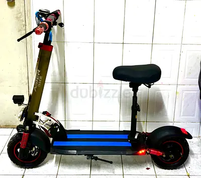Electric Scooter with Seat — , Good Condition