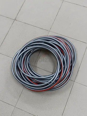 Garden/Utility Water Hose - Coiled, Good Condition 1/4inch (25m)