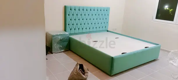 Turquoise upholstered double bed frame with headboard - barely used