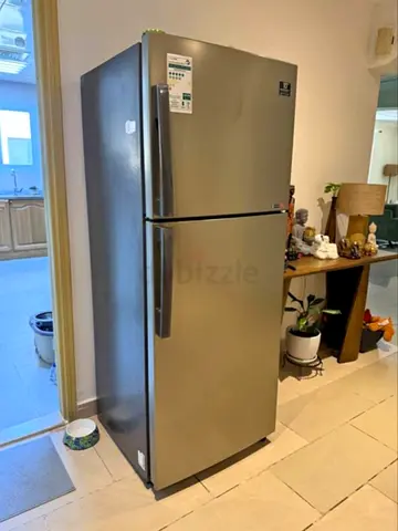 Used stainless steel top-freezer refrigerator - good condition