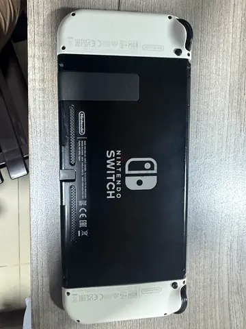 Nintendo Switch (original) console with white Joy-Con - used, good condition with Account PAID GAMES