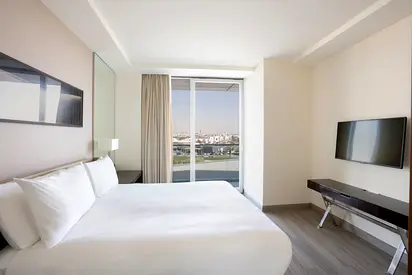 Modern sophistication with urban views in fully furnished 1 Bedroom Apartment