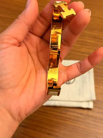 Gold-tone hermes bracelet with H logo clasp - preowned