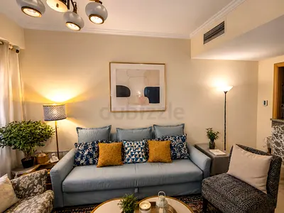 Ikea 3-seater slipcovered sofa with cushions and it comes with 2 extra covers!