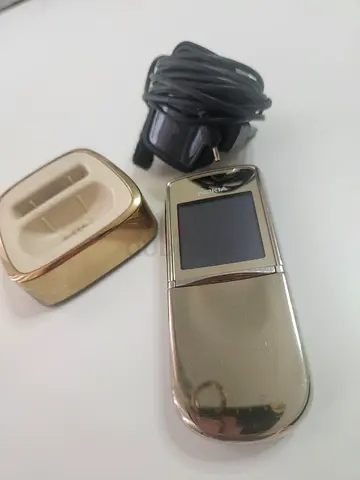 Used Nokia 8800 Gold Edition with charger and dock - good condition