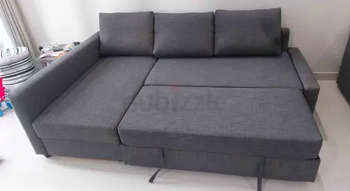 Grey L-Shaped Sofa Bed with Pull Out Section