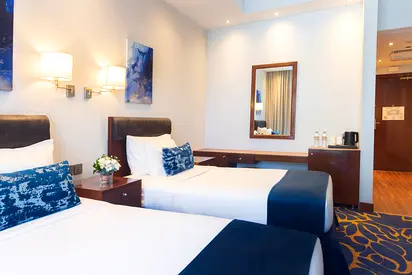 Fully Renovated Two-Bedroom Apartment at MD Hotel by Gewan, Daily Free shuttle bus to JBR Beach and Outlet Mall (4 STAR HOTEL)
