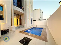 Al Zahia Luxury corner villa with 6 BR, pool,roof. Includes Reg fees, electricity, water, and AC.