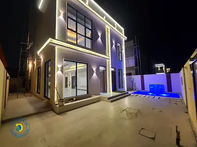 Modern 5BR villa with pool and roof, including registration fees, in Al-Helio 1, freehold